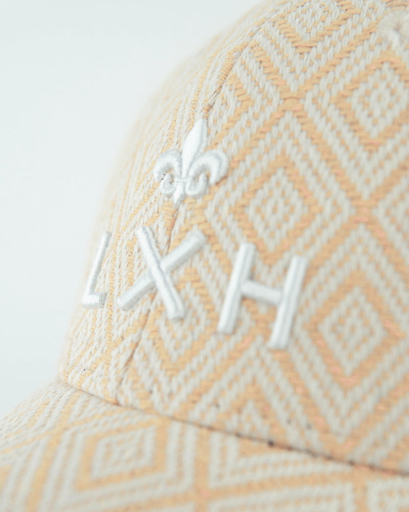LXH CASQUETTE « HÉRITAGE » MOTIFS BEIGE / BLANC