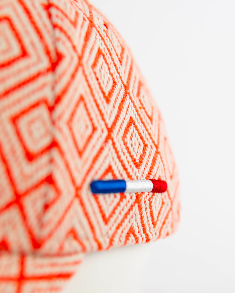 LXH CASQUETTE « HÉRITAGE » MOTIFS ORANGE / BLANC